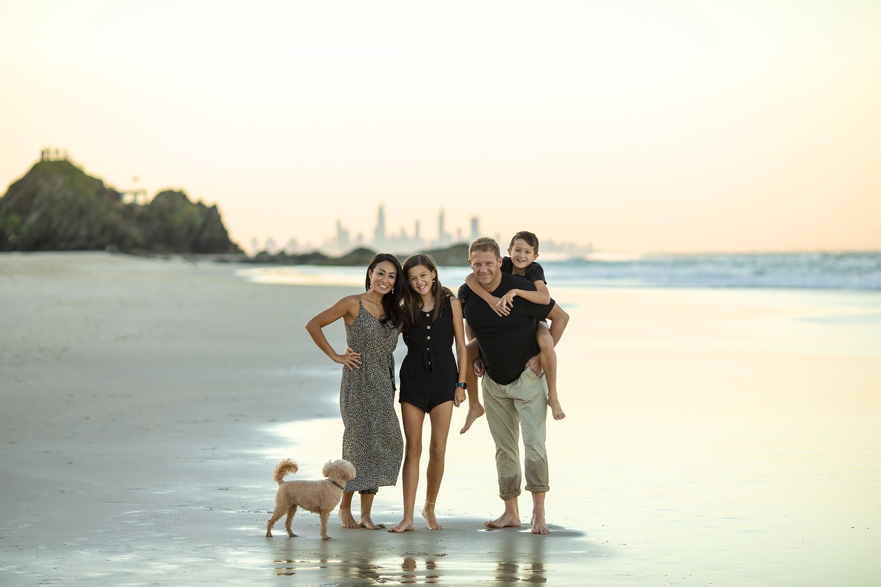 Family with dog on a beach